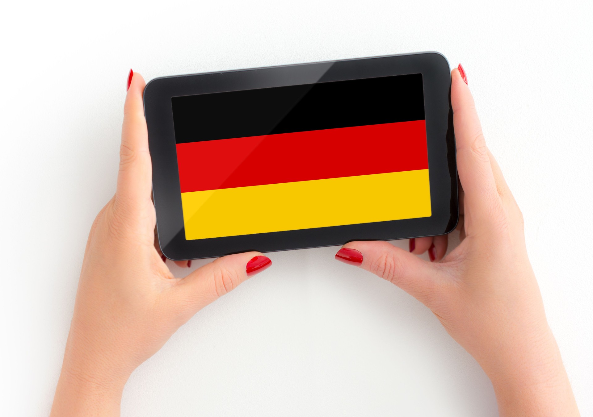 Woman holds her tablet with German Flag